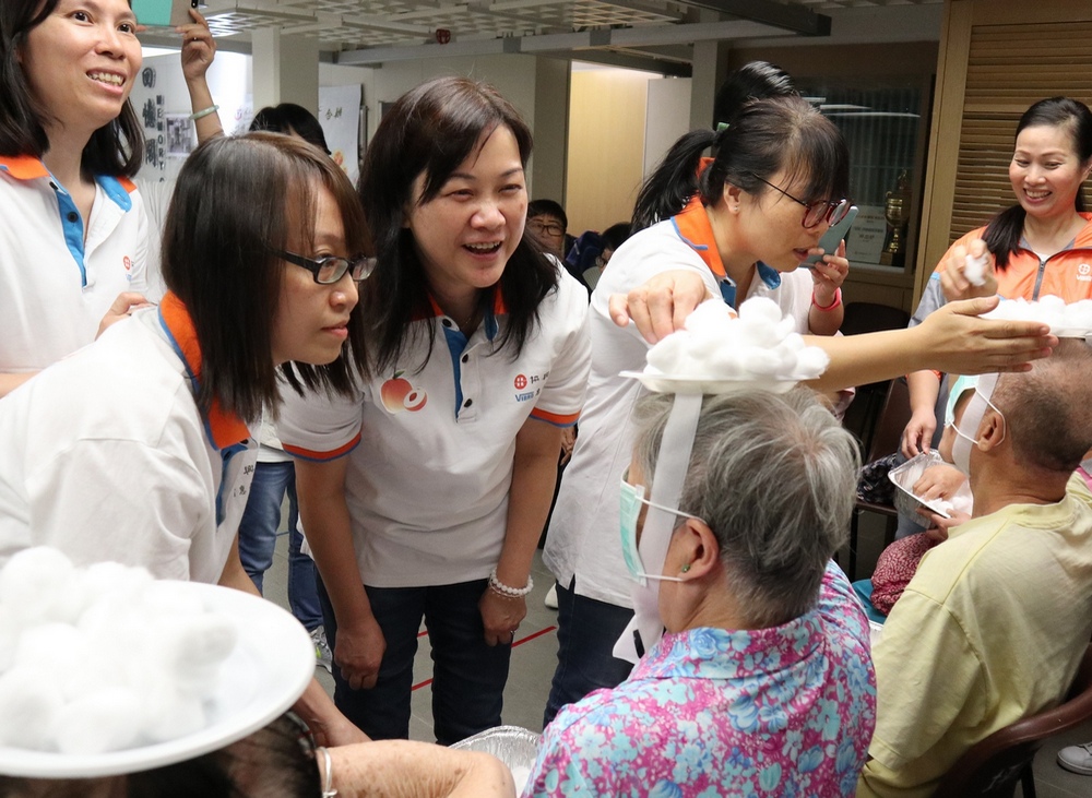 Both volunteers and seniors enjoy fun-filled games